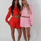 Pink tailored zip up jacket and pleated skirt set