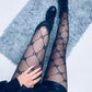 Pattern black tights
