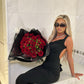 ‘Khloe’ black open back bow dress