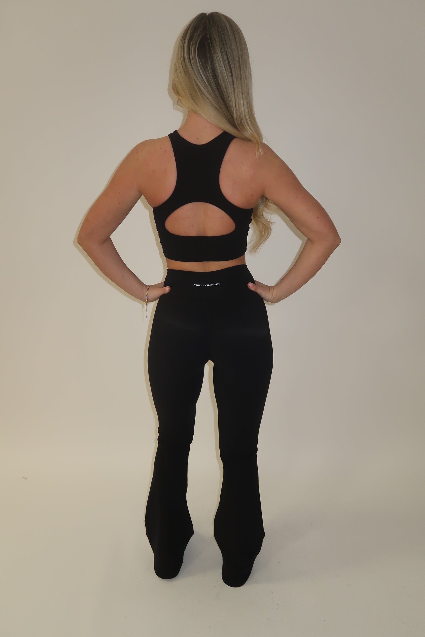 GYM GIRL ERA EXCLUSIVE Black sculpt V waist flared bottoms