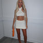 White halter neck knit skirt co ord