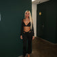 Black buckled top and flared bottoms co-ord