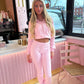 Pink cropped zip hoodie and bell bottom trouser set