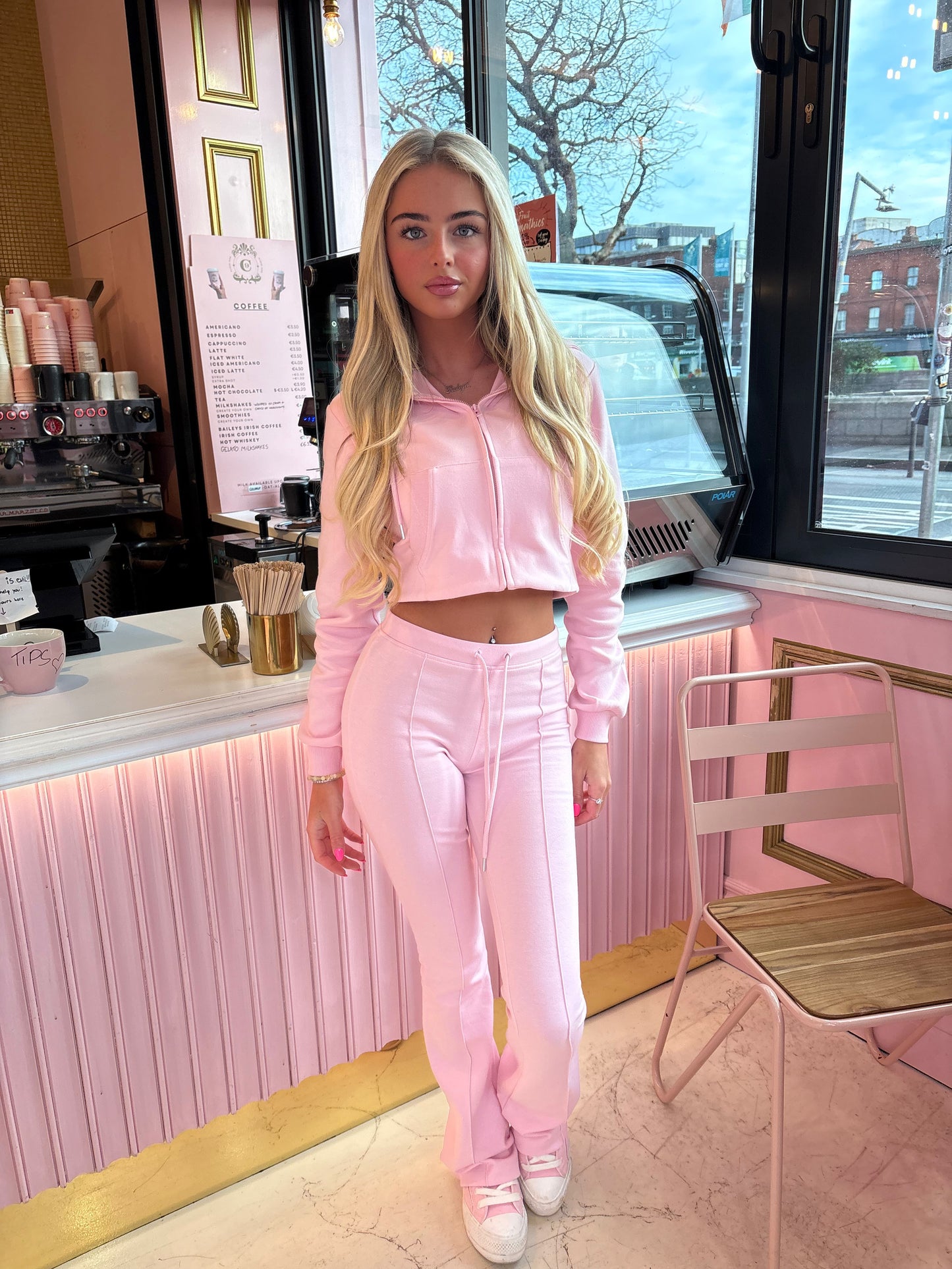 Pink cropped zip hoodie and bell bottom trouser set