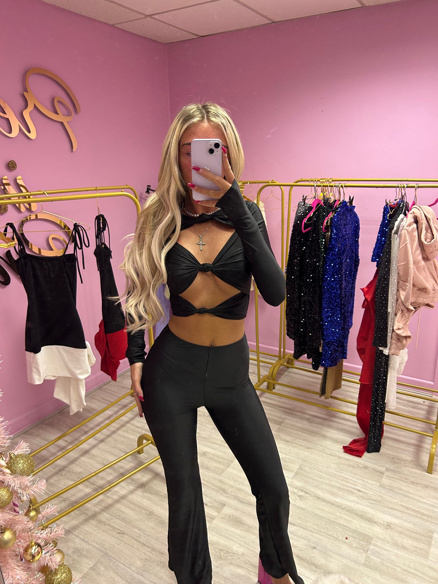 Black slinky cut out top and flared bottoms