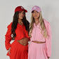 Red tailored zip up jacket and pleated skirt set