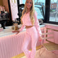 Pink cropped zip hoodie and bell bottom trouser set