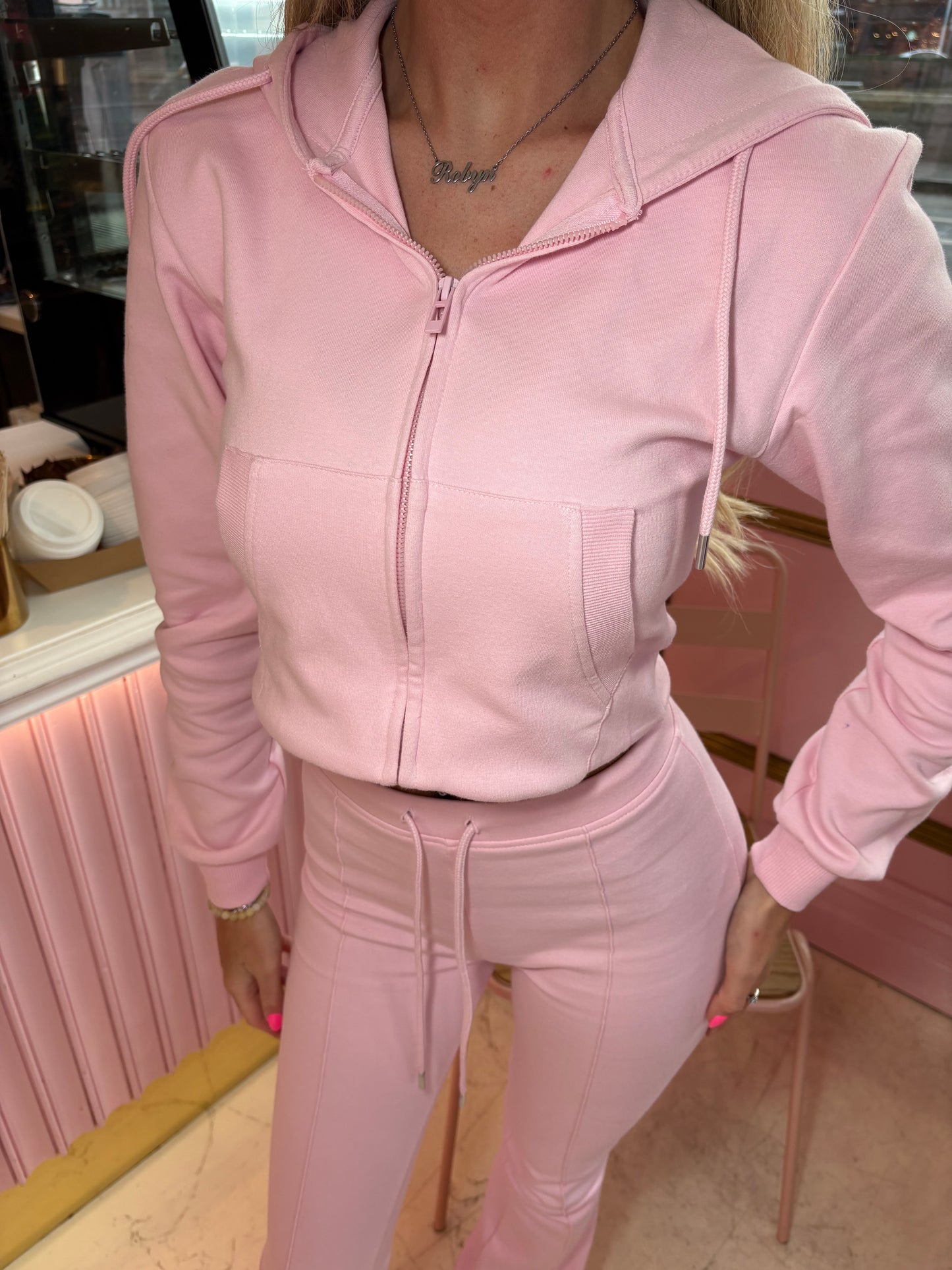 Pink cropped zip hoodie and bell bottom trouser set
