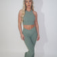 GYM GIRL ERA EXCLUSIVE Sage green sculpt V waist flared bottoms