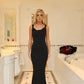 ‘Khloe’ black open back bow dress