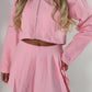 Pink tailored zip up jacket and pleated skirt set