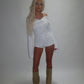 LIMITED EDITION HAND MADE AND DESIGNED IN HOUSE: ‘Angel’ white playsuit