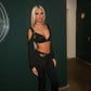 Black buckled top and flared bottoms co-ord