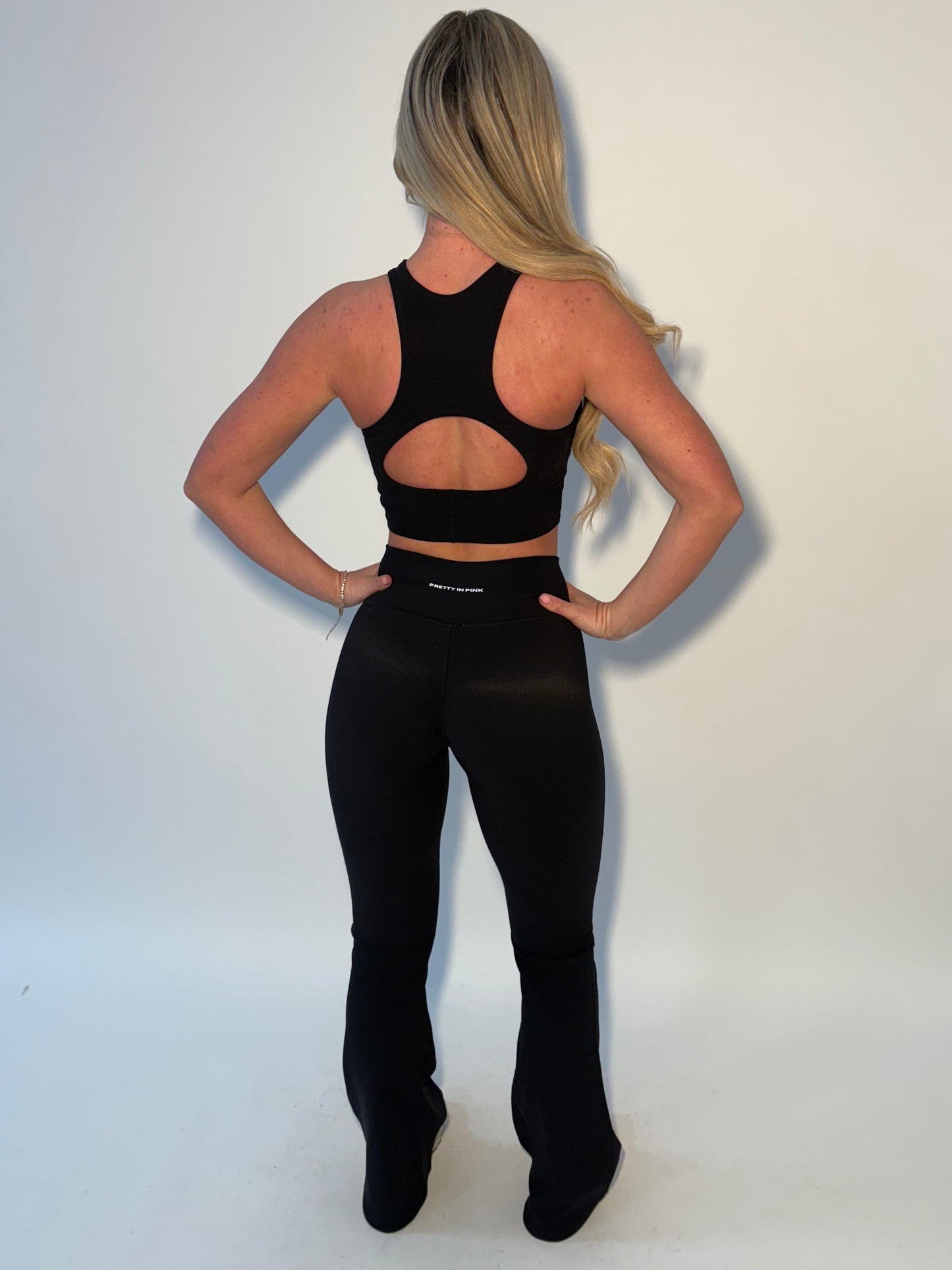 GYM GIRL ERA EXCLUSIVE Black sculpt V waist flared bottoms