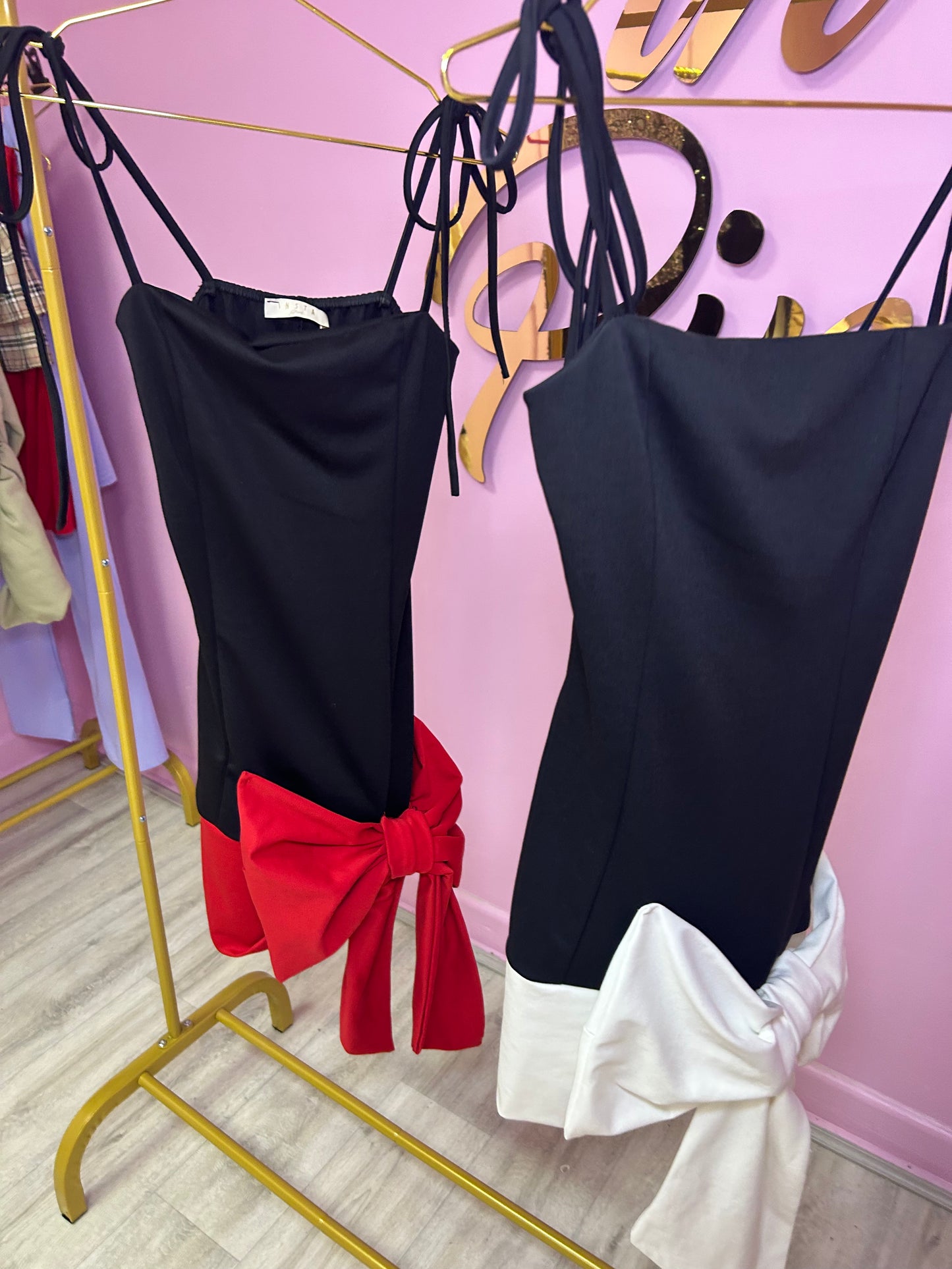 Black and red bow front mini dress