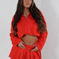 Red tailored zip up jacket and pleated skirt set