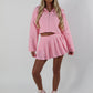 Pink tailored zip up jacket and pleated skirt set