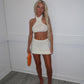 White halter neck knit skirt co ord