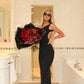 ‘Khloe’ black open back bow dress