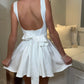 White bow back skater dress