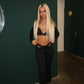 Black buckled top and flared bottoms co-ord