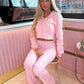 Pink cropped zip hoodie and bell bottom trouser set