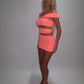 LIMITED EDITION HAND MADE AND DESIGNED IN HOUSE: ‘Aries’ coral cut out dress