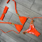 Neon orange bikini top and head band