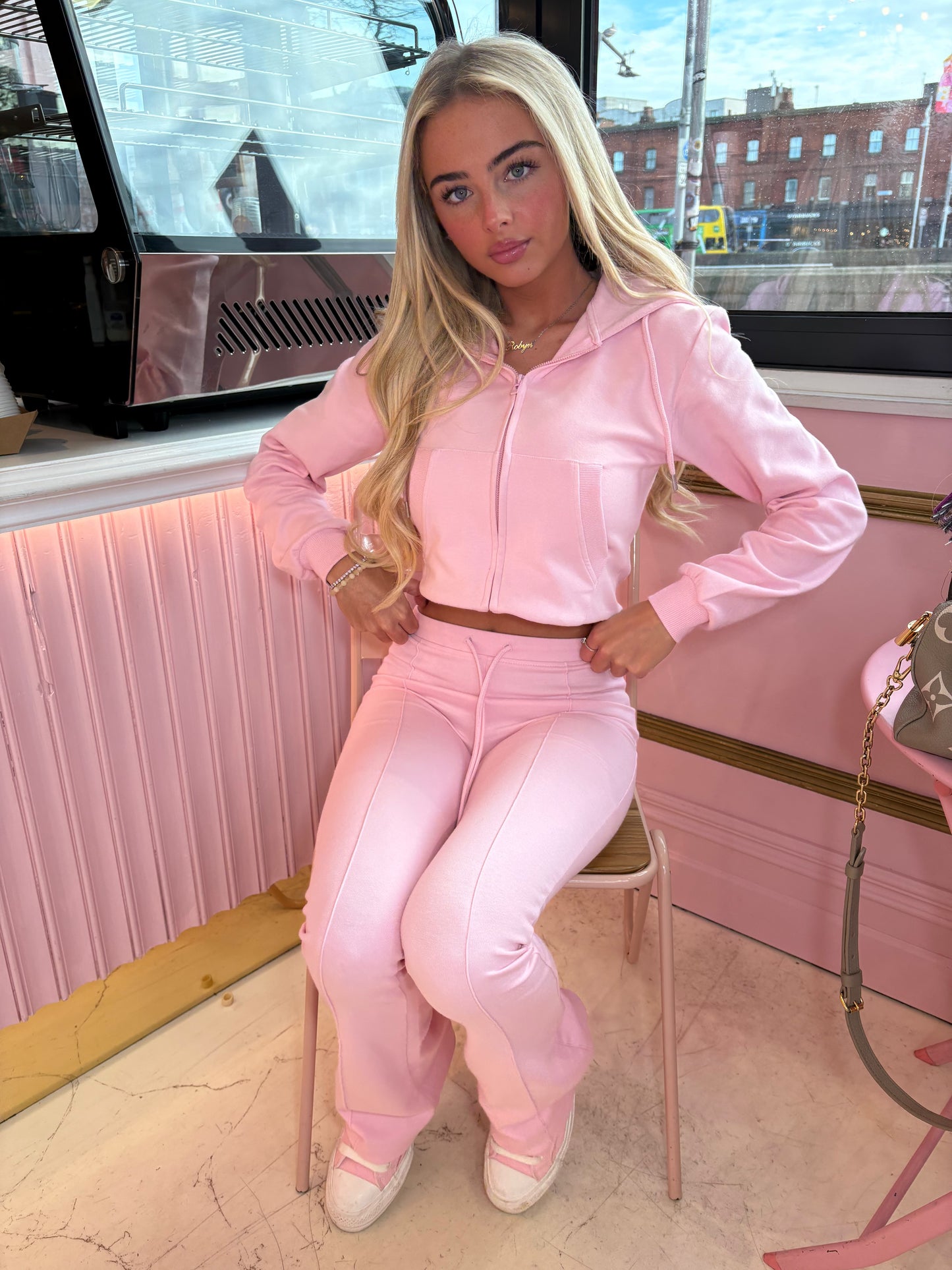 Pink cropped zip hoodie and bell bottom trouser set