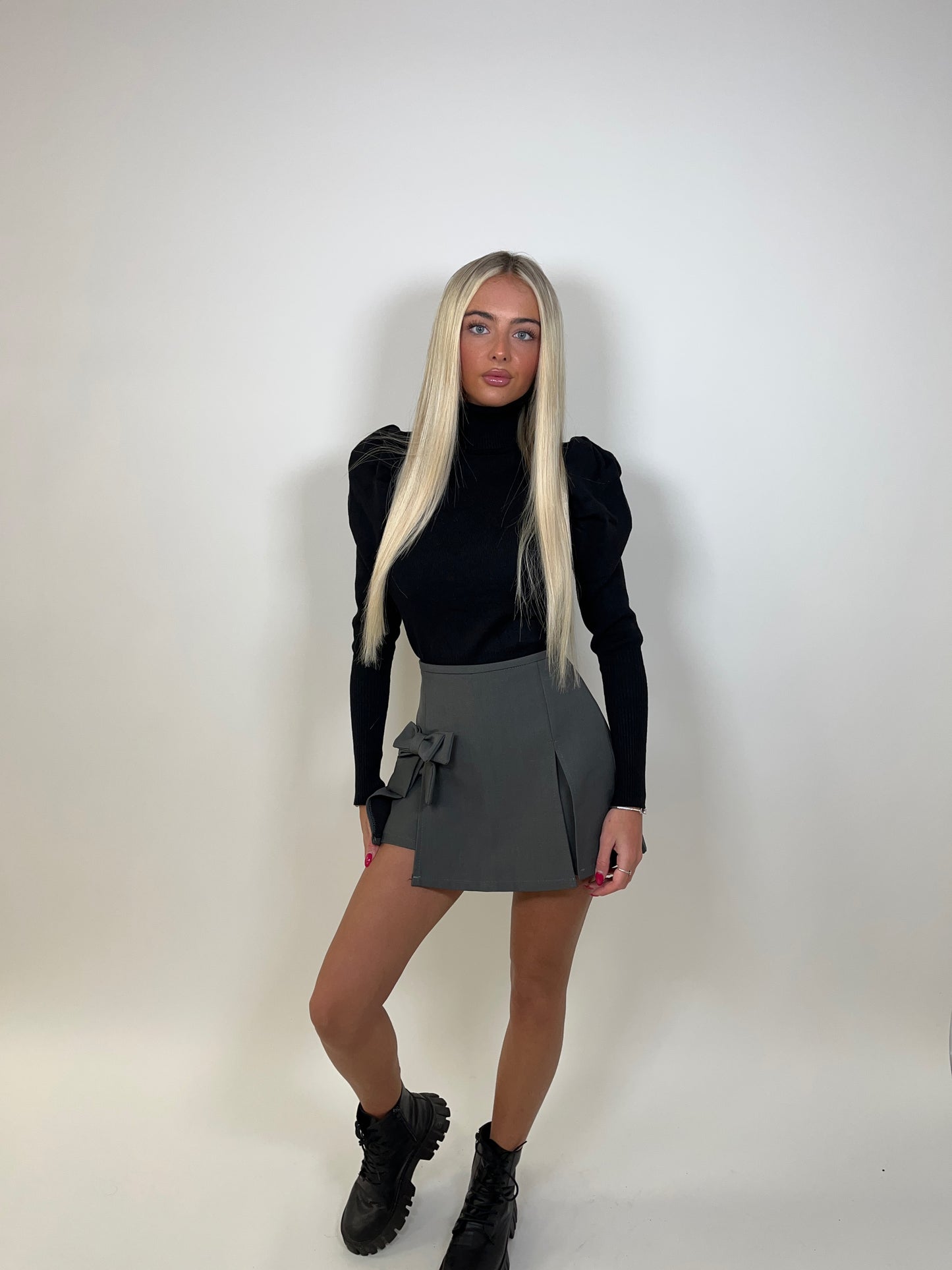Black high neck puff sleeve ribbed jumper
