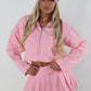 Pink tailored zip up jacket and pleated skirt set