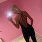Black cut out criss cross back jumpsuit