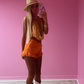Orange frayed hem shorts
