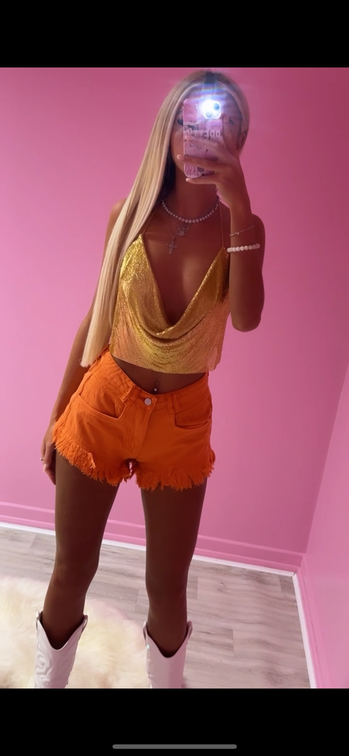 Orange frayed hem shorts