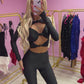 Black slinky cut out top and flared bottoms