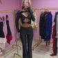 Black slinky cut out top and flared bottoms