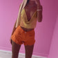 Orange frayed hem shorts