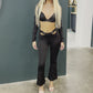 Black buckled top and flared bottoms co-ord